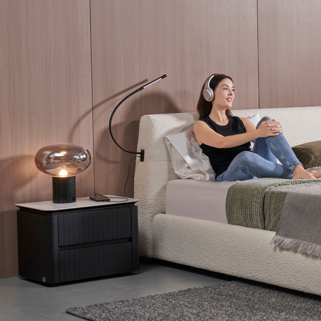 Ava Bedside Table in Black Oak timber finish in a modern bedroom