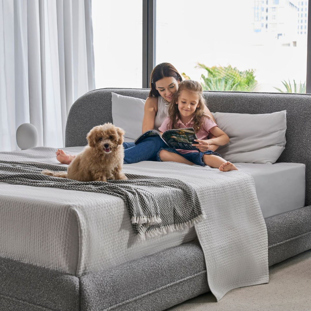 Caleb Bed side profile showing the upholstered frame