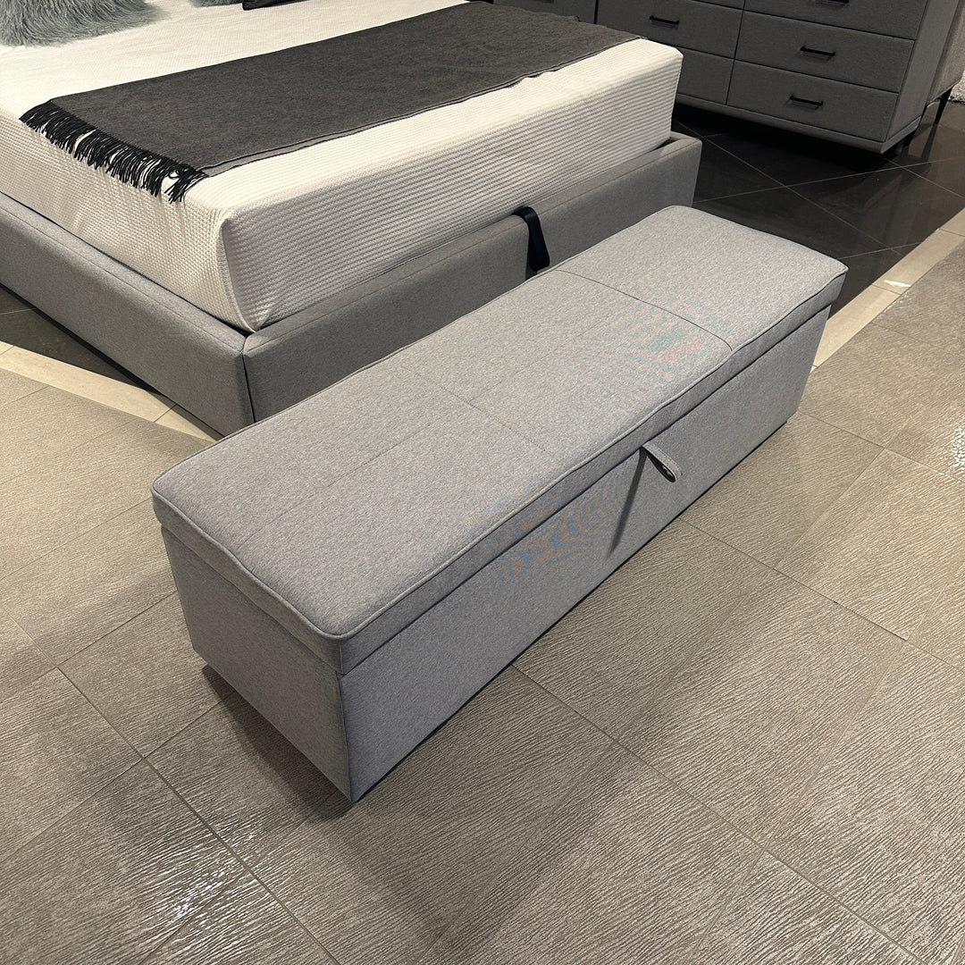 Windsor Storage Ottoman with the gas strut lid open showing storage