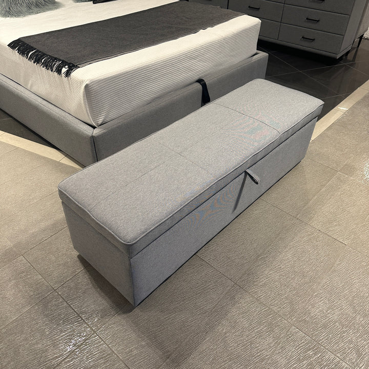 Windsor Storage Ottoman with the gas strut lid open showing storage