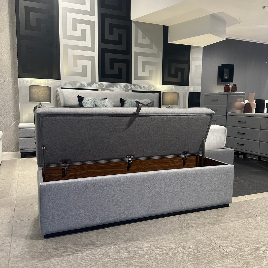 Windsor Storage Ottoman side view showing the upholstered design