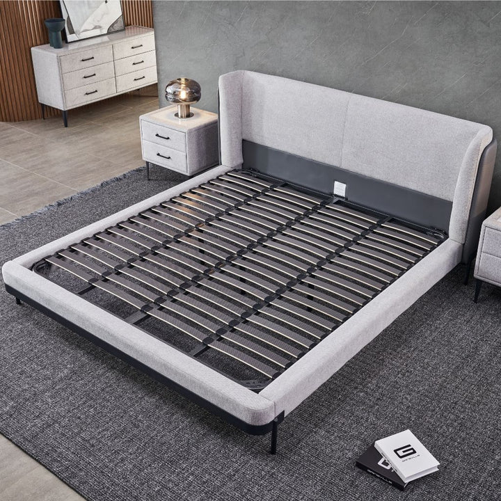 Kimberley Bed showing the upholstered frame and two-tone headboard detail