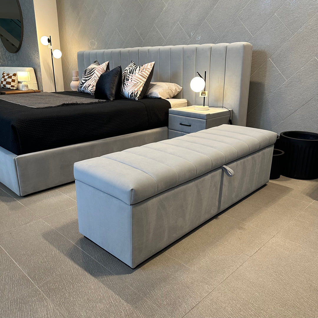 Rosetta Storage Ottoman upholstered to match the Rosetta Bed at the foot of a bed