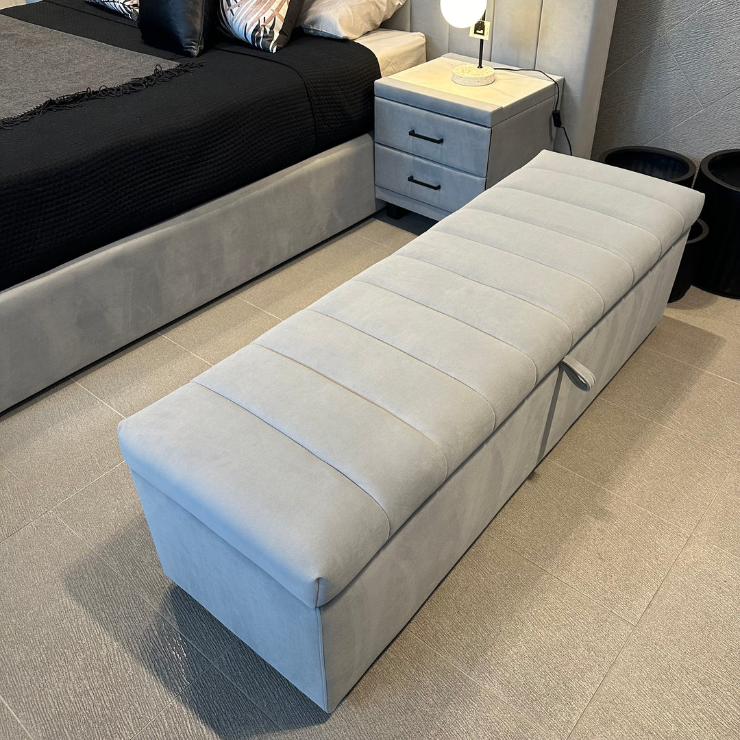 Rosetta Storage Ottoman side view showing the upholstered design