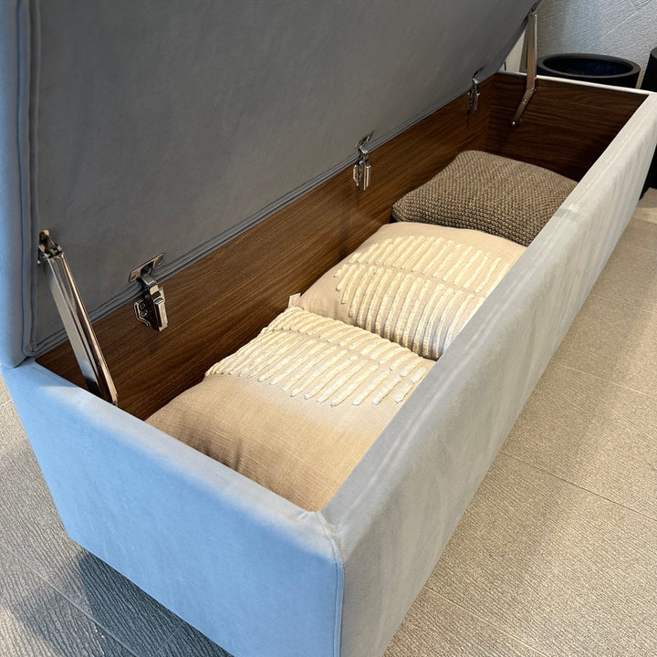 Rosetta Storage Ottoman showing the classic upholstered finish