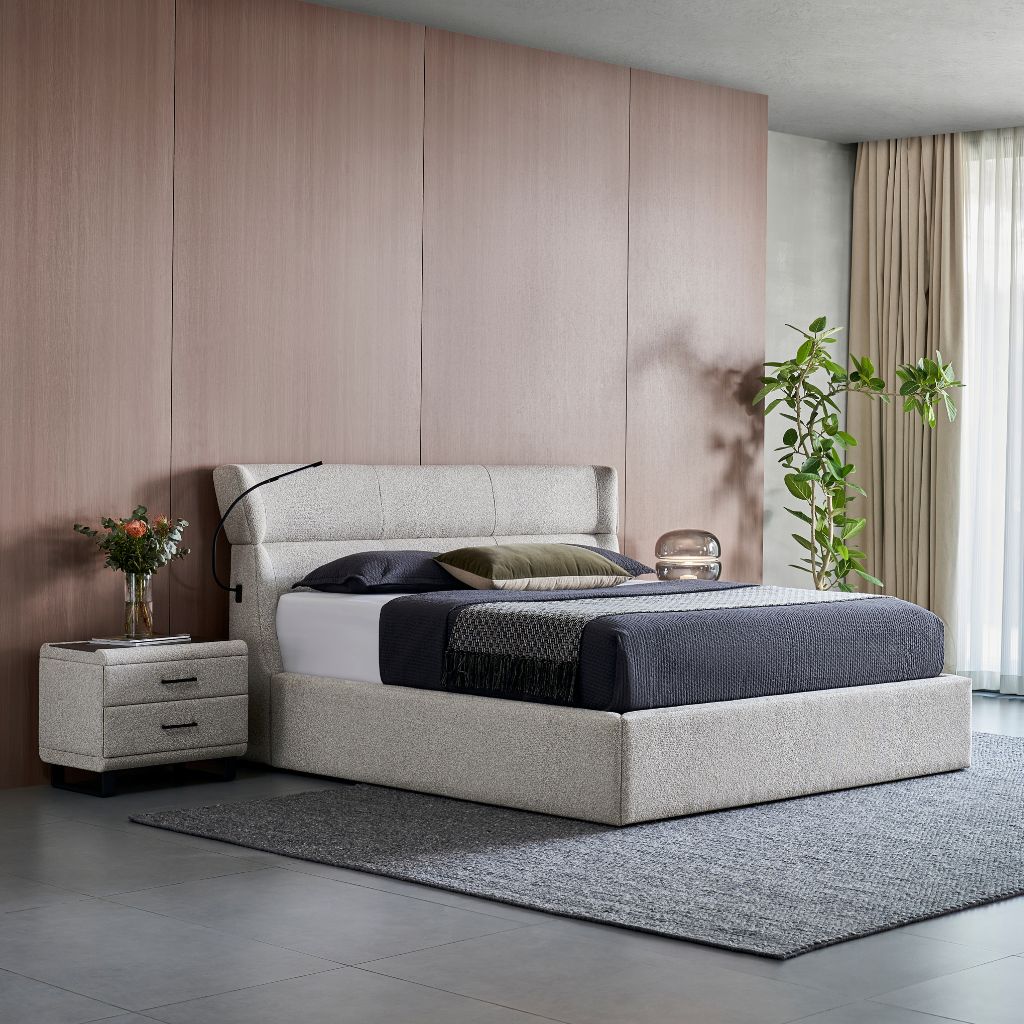 Windsor Bed showing the upholstered frame and cushioned headboard