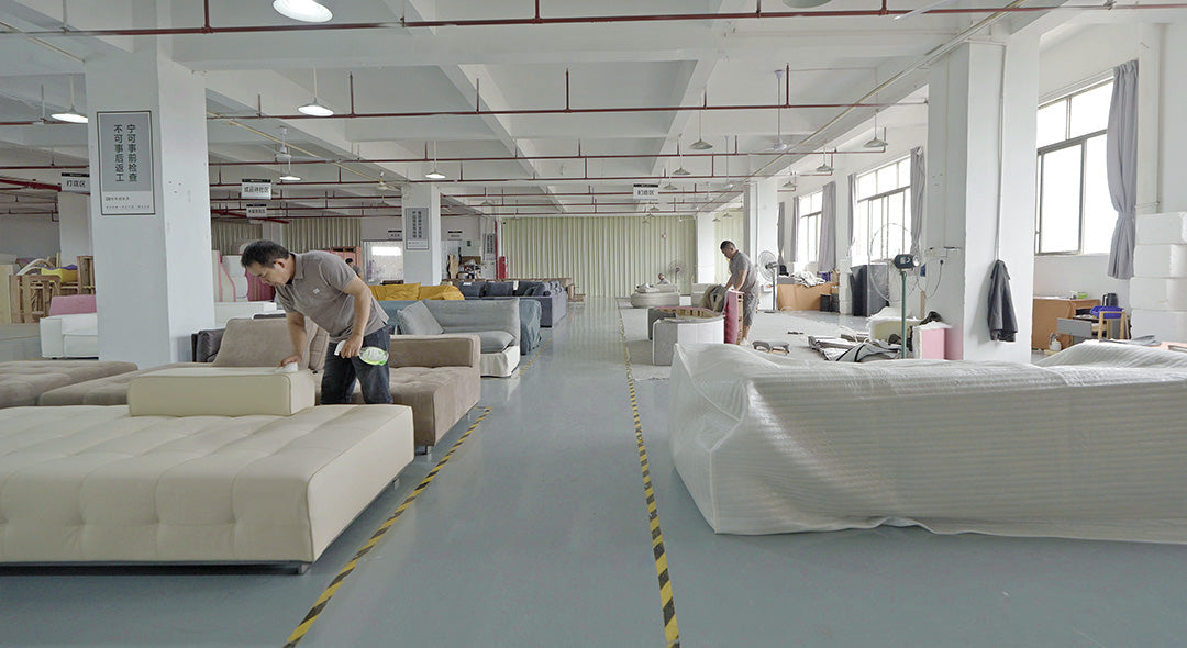 Sofas being finished in the Gainsville sofa workshop