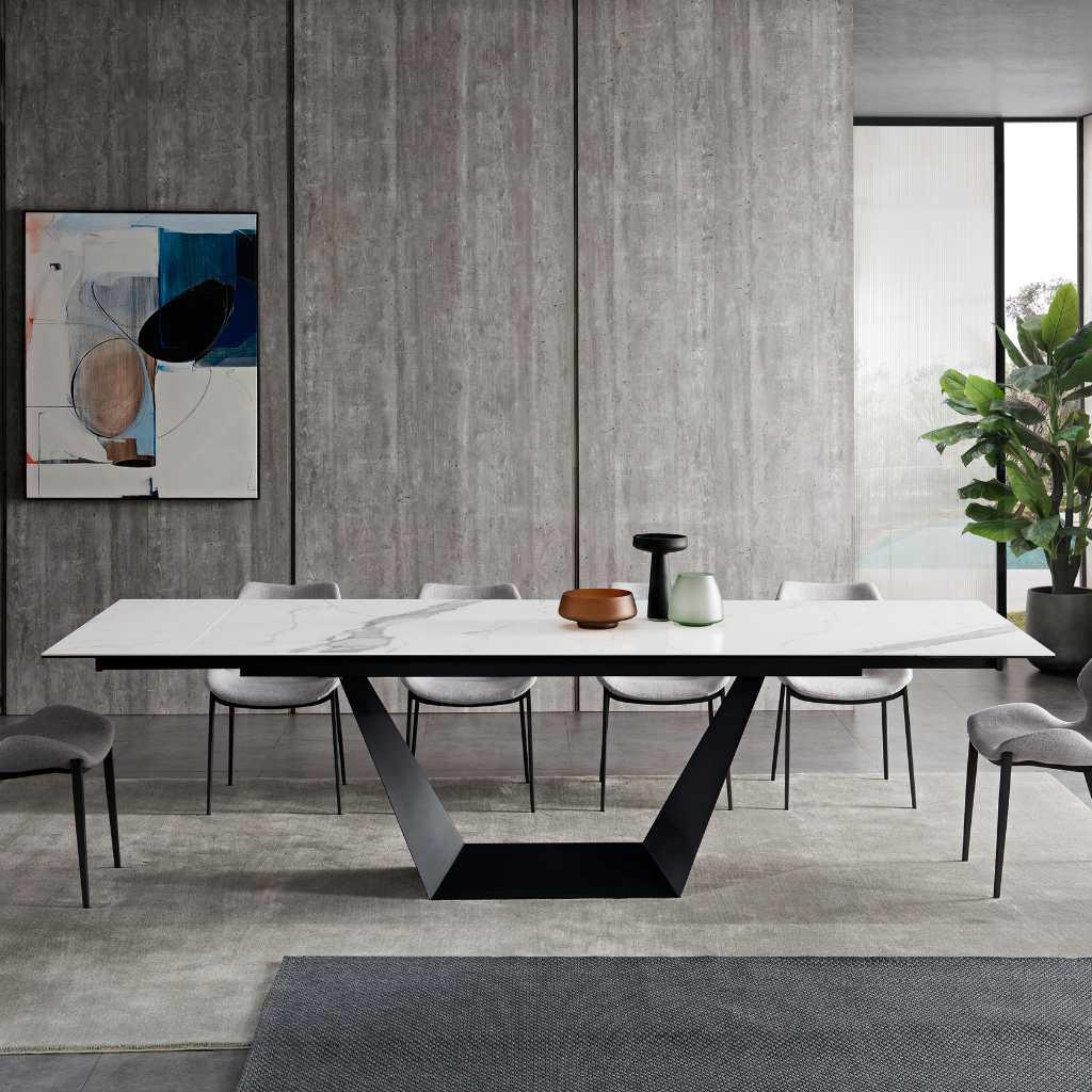 Veyron Dining Table with a porcelain top and black powder-coated steel base