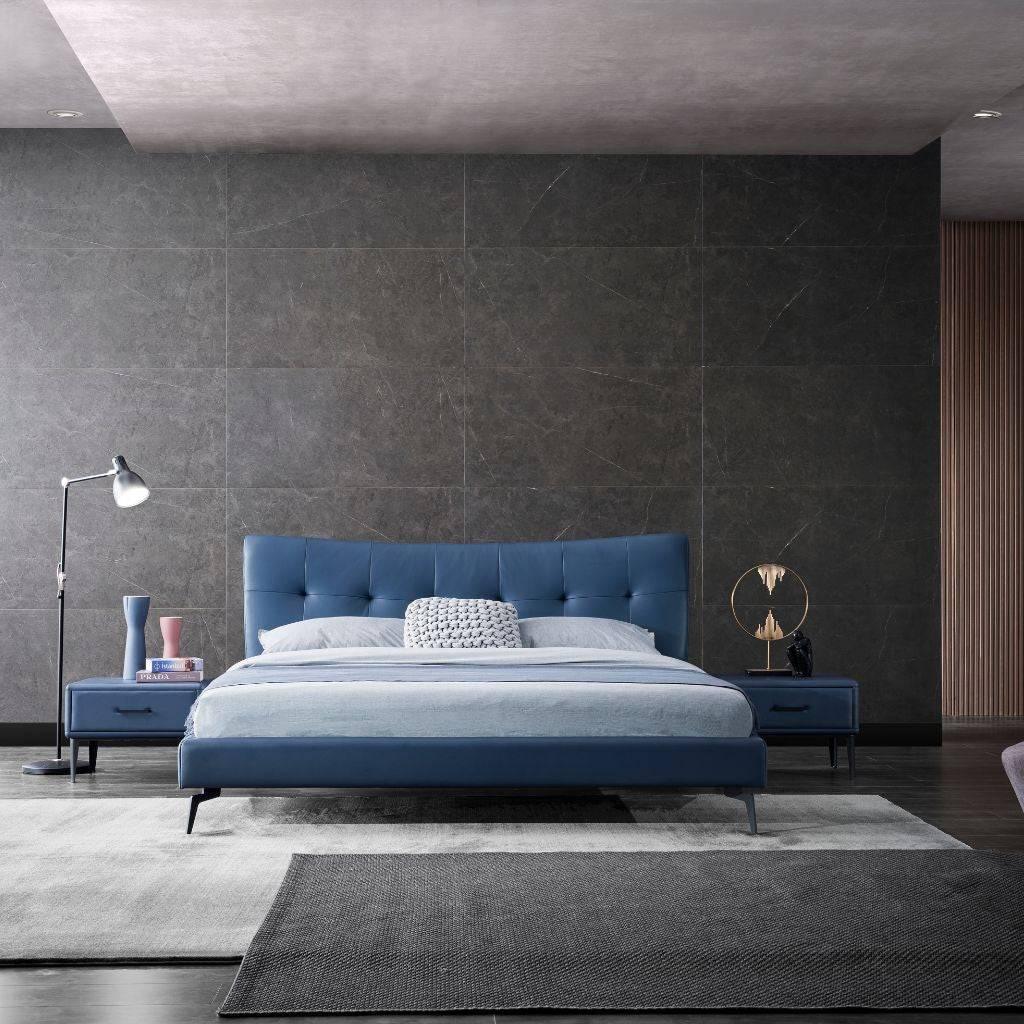 Vira Bed in leather showing the tufted headboard detail
